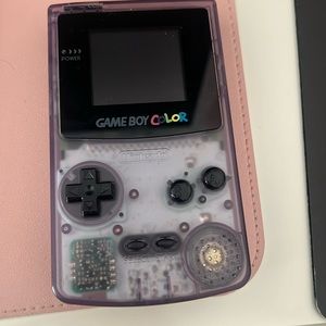 Backlight updated gameboy color. Works great and in beautiful condition. 90’s